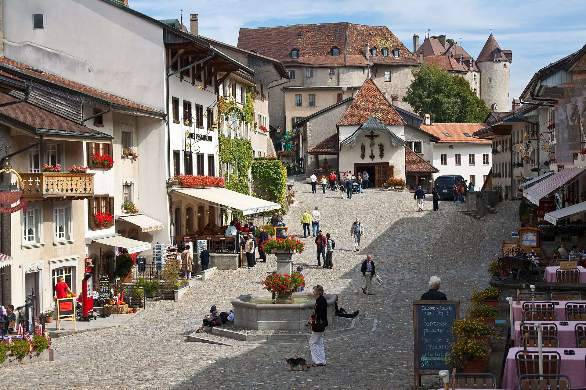 The main street of Gruyères below the castle