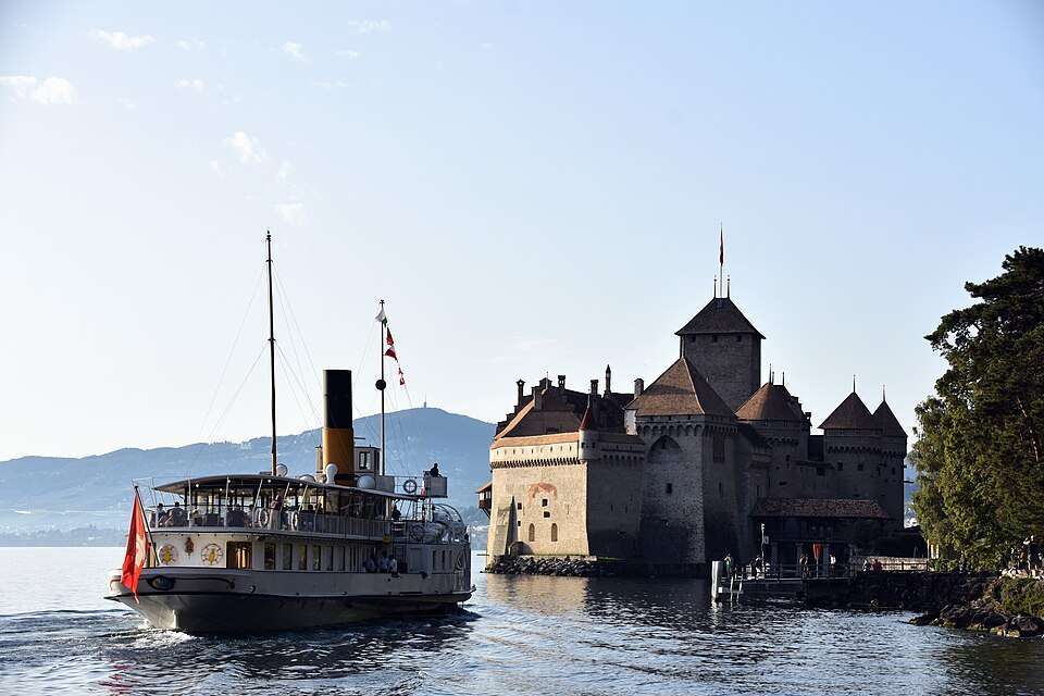 Chillon Castle on Lake Geneva with a paddle steamer