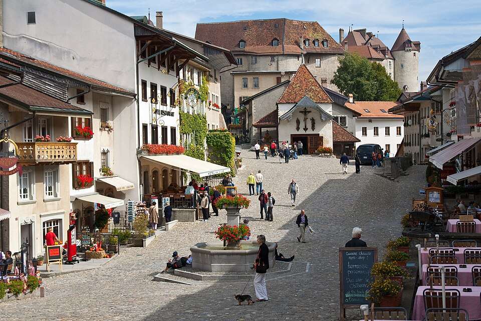 The main street of Gruyères below the castle